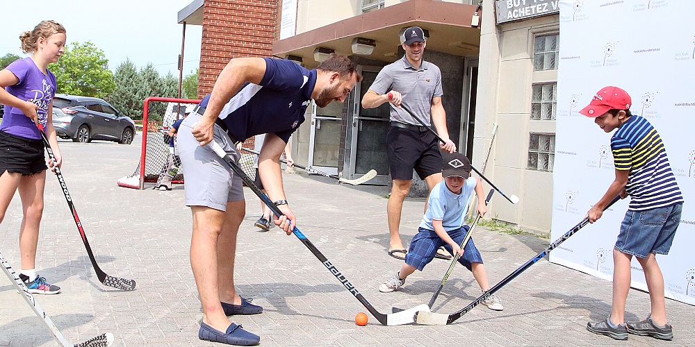 ‘That’s the reason why I do it’ — NHL vs. Docs scoring for local kids, families
